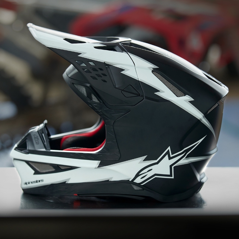 Alpinestars Supertech S-M10 Ampress motokrossikiiver matt must ja valge
