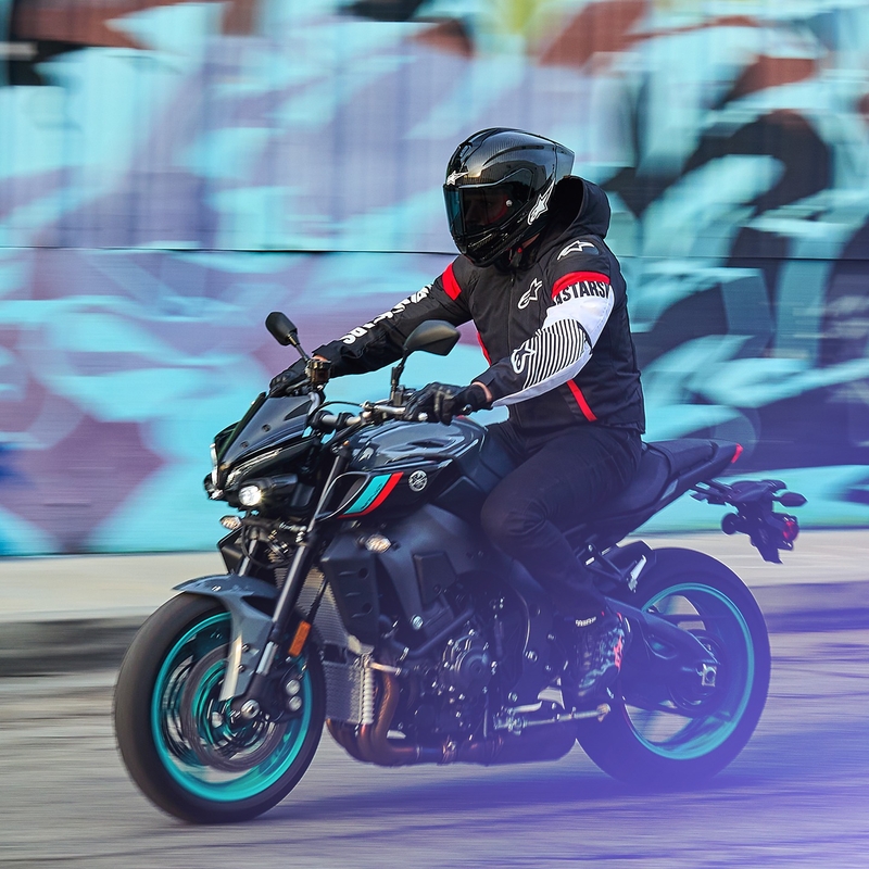 Alpinestars Zaca Air veekindel must, valge ja fluo punane mootorratta jope