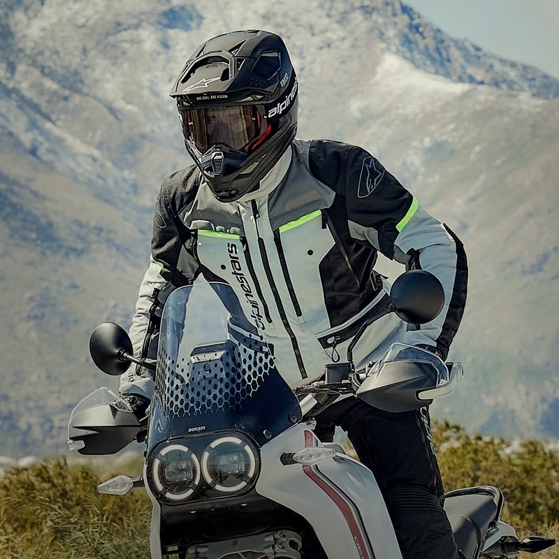 Alpinestars Bogota PRO Drystar hall-must-fluo kollane mootorratta jope