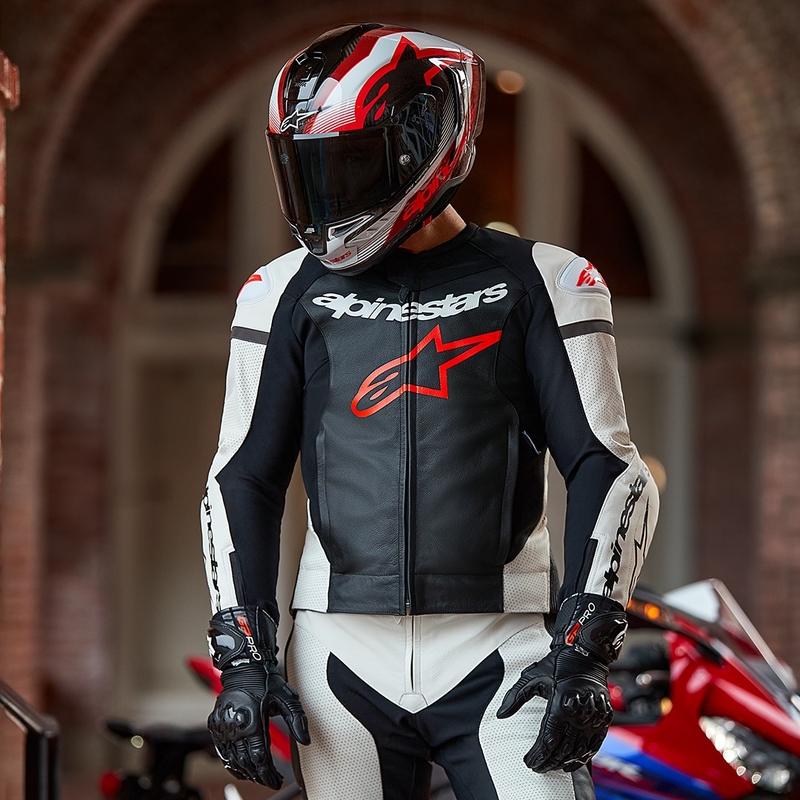 Alpinestars GP Force Lurv valge-must-floo punane kaheosaline nahast kombinesoon