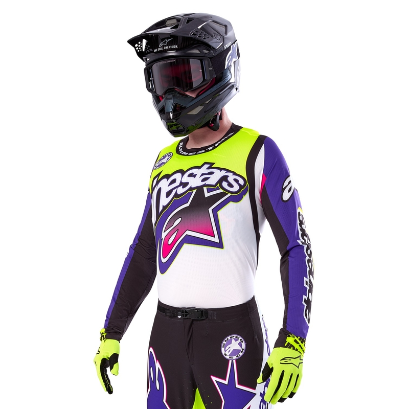Alpinestars Supertech SX Limited Edition Dirt Studios valge-lilla-roosa-roosakas-fluo kollane motokrossitrikoo