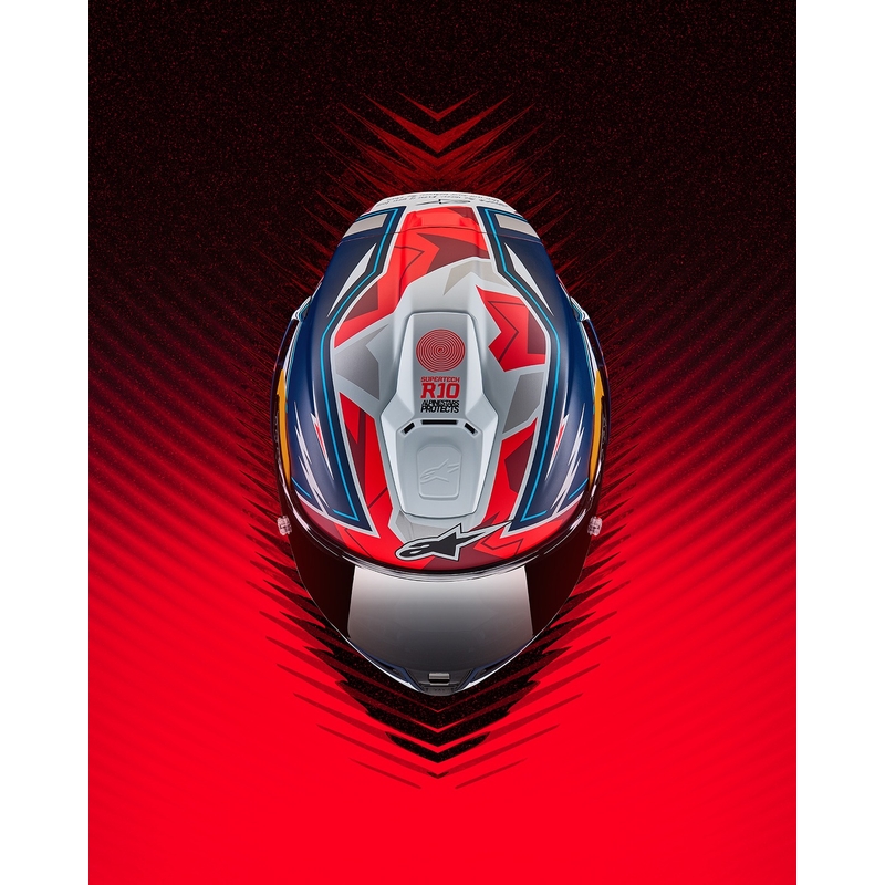 Alpinestars Supertech R-10 piiratud Pedro Acosta mattsinine-punase-valge integraalne mootorratta kiiver.