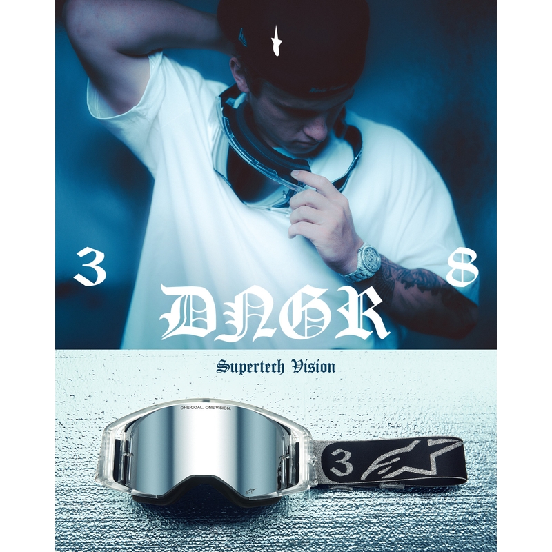 Alpinestars Supertech Vision DNGR38 XXV mustad ja hõbedased motokrossiprillid peegelpeegliga hõbedase pleksiga.