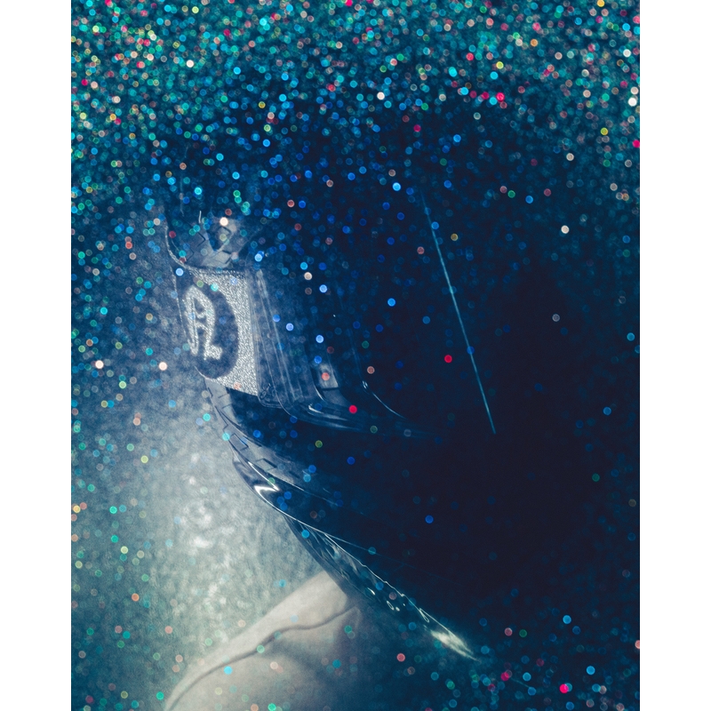 Alpinestars Supertech Vision DNGR38 XXV mustad ja hõbedased motokrossiprillid peegelpeegliga hõbedase pleksiga.