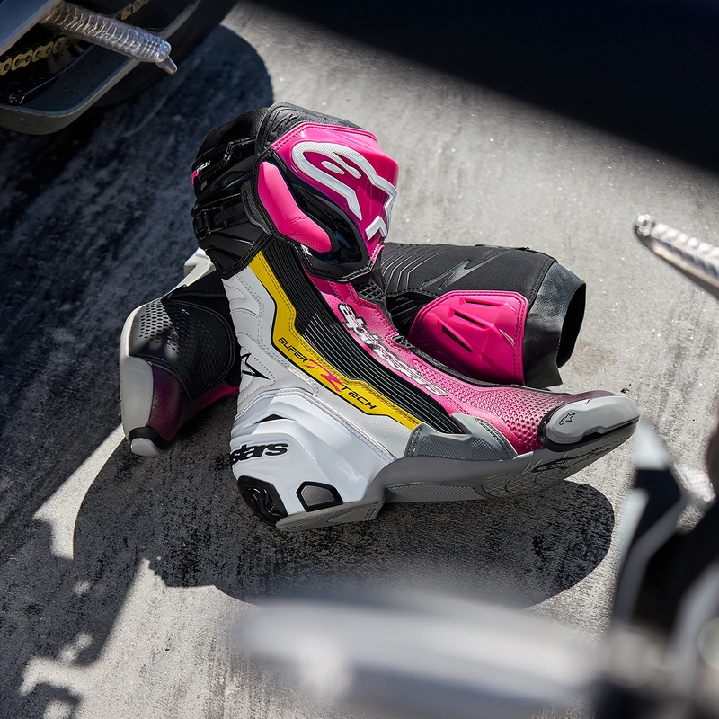 Alpinestars Supertech R mootorrattasaapad must-valge-roosa-kollane