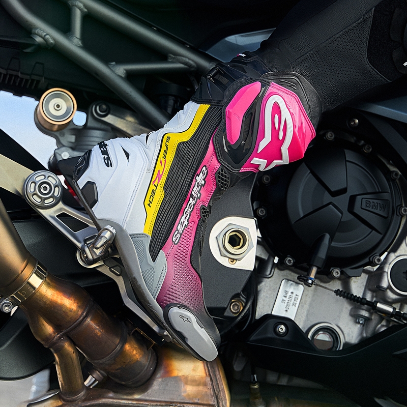 Alpinestars Supertech R mootorrattasaapad must-valge-roosa-kollane